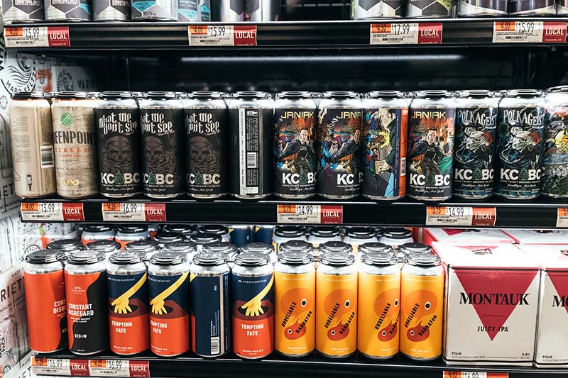 Fresh cans from renowned breweries such as Barrier Brewing, Grimm Artisanal Ales, Threes and KCBC line the shelves of fridges at corner shop bodegas at $4.99 a pop
